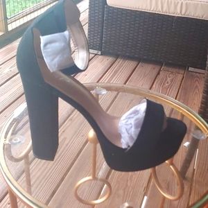 High heels Black suede with gold buckle